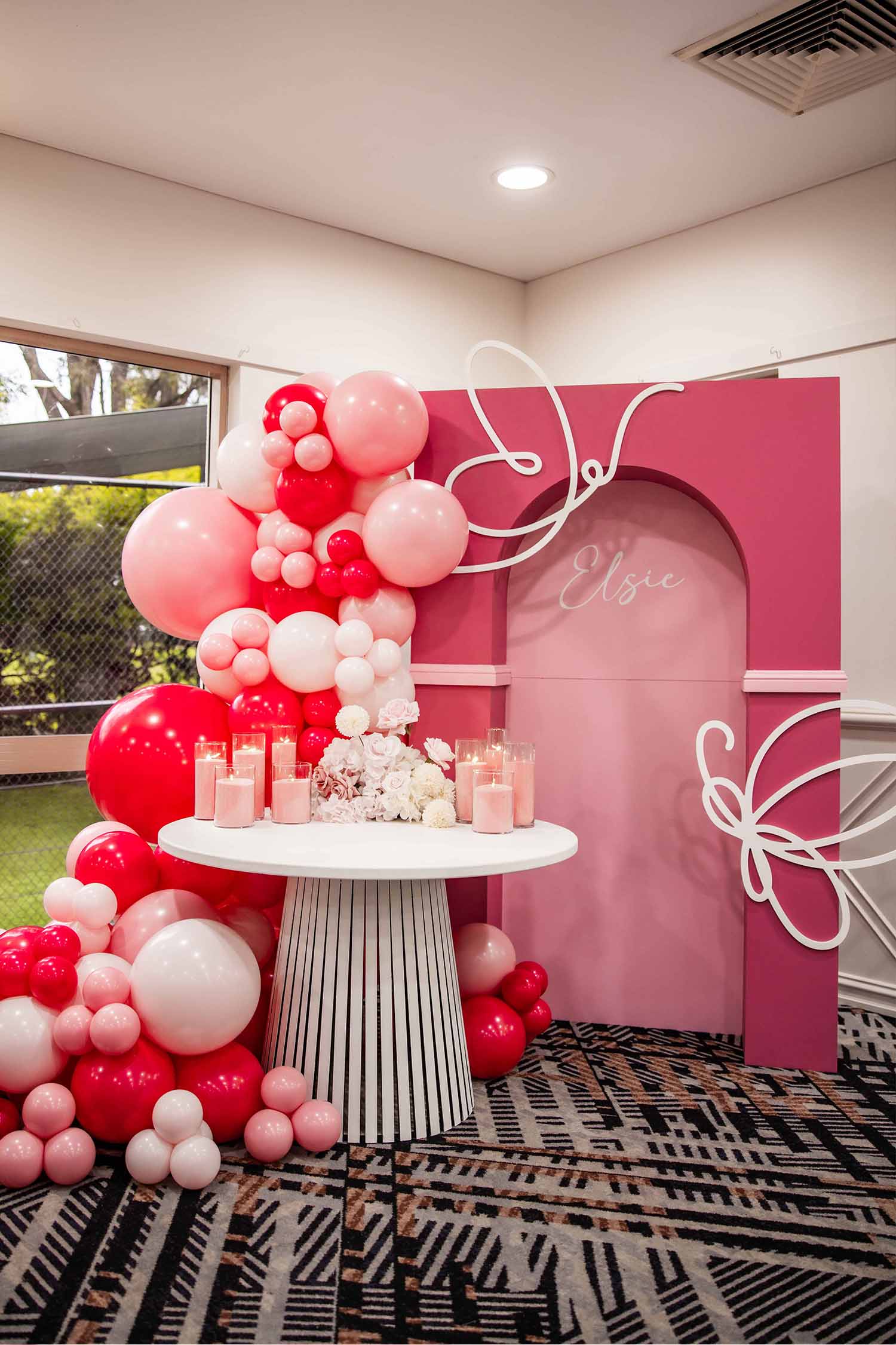 Pink birthday decoration set up in Functions room at Leonay Golf Club