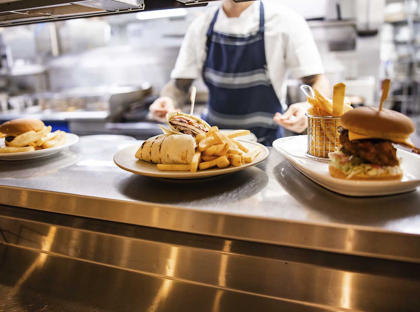 Plates of food waiting to be served from the kitchen at Leonay Golf Club